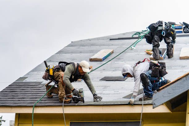 Professional Roofing technician working in Byers, CO